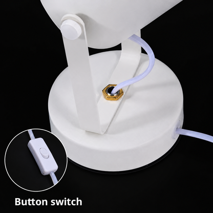 Close-up detail of the ambient water ripple projector base with integrated button switch and premium white finish.